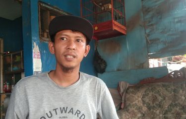 Irfan Revolin (31), warga Kalijurang, Desa Purwasari, Kecamatan Purwasari, Kabupaten Karawang, Jawa Barat.