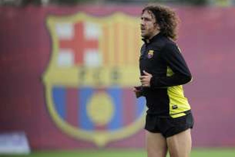 Mantan kapten Barcelona, Carles Puyol, kala masih aktif berkarier sebagai pesepak bola. Puyol gantung sepatu pada akhir musim 2013-2014.