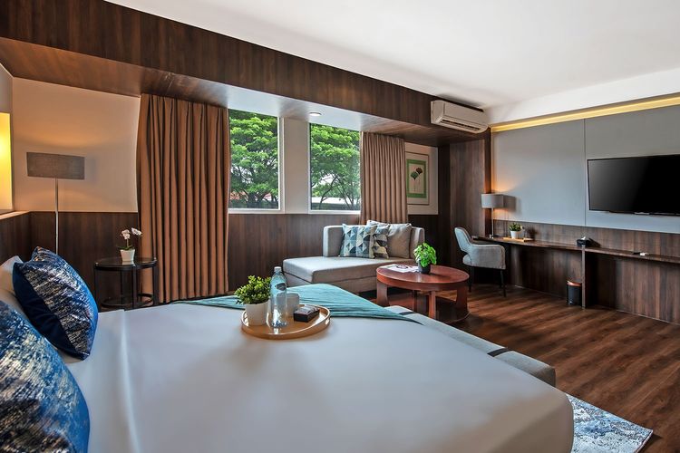 Ilustrasi kamar tipe Deluxe Suite di Oakwood Hotel & Apartments Taman Mini Jakarta, Jakarta Timur.