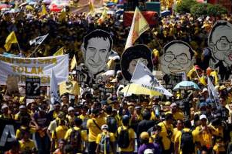 Kelompok pro-demokrasi Malaysia, Bersih, Sabtu (19/11/2016), menggelar unjuk rasa di Kuala Lumpur untuk menuntut PM Najib Razak mundur karena diduga terlibat dalam pusaran korupsi dana investasi negara 1MDB.