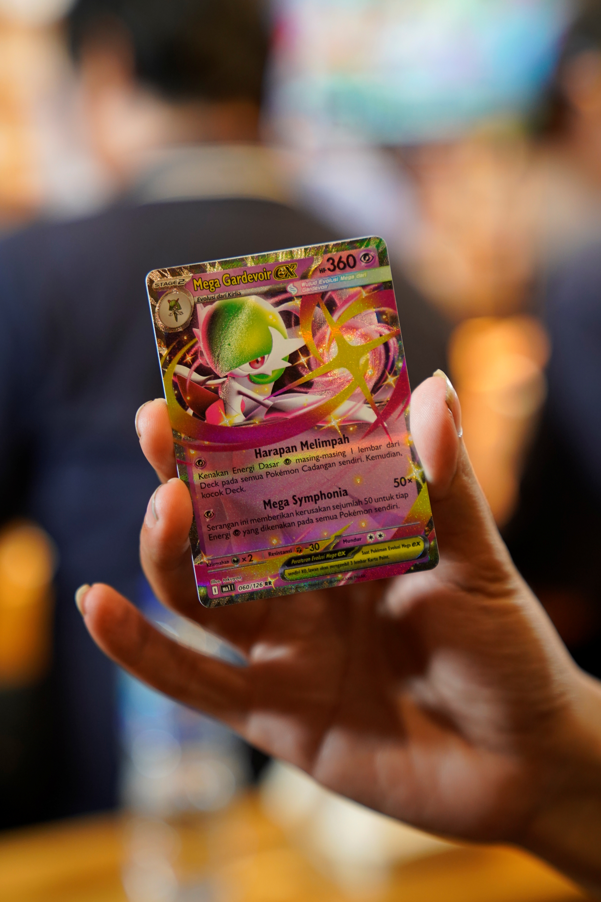 Mega Gardevoir ex, salah satu kartu unggulan kartu Pokemon dalam seri Evolusi Mega.