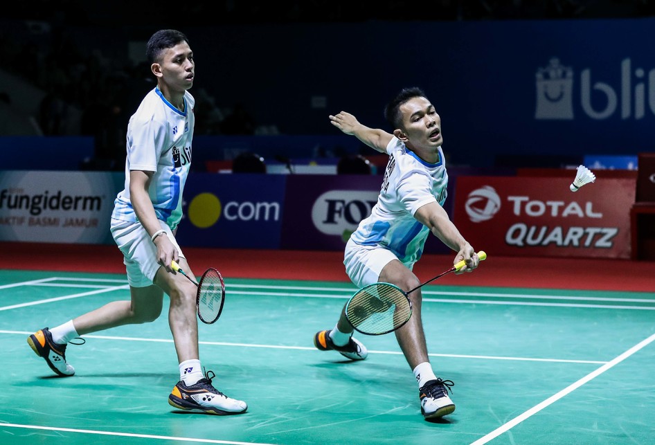 Pasangan ganda putra Indonesia, Fajar Alfian/Muhammad Rian Ardianto saat melawan ganda putra China, Huang Kai Xiang/Liu Cheng dalam babak kedua Blibli Indonesia Open 2019 di Istora Senayan, kompleks GBK, Jakarta, Rabu (17/7/2019).