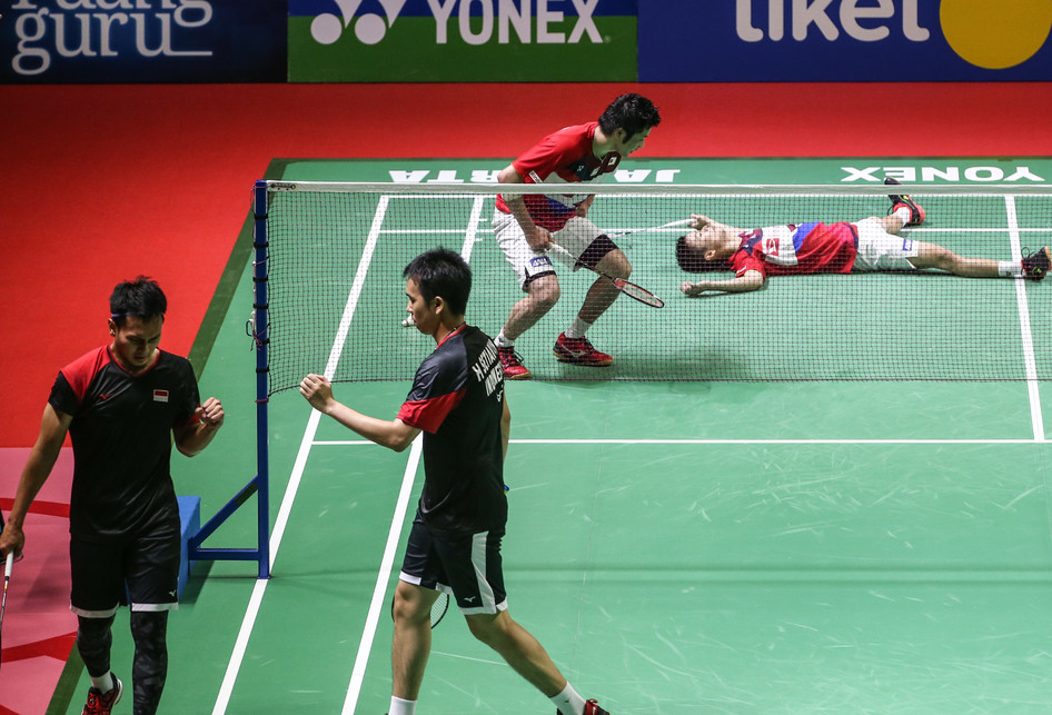 Ganda putra Indonesia, Mohammad Ahsan/Hendra Setiawan, bertanding melawan ganda putra Jepang, Hiroyuki Endo/Yuta Watanabe pada pertandingan perempatfinal Blibli Indonesia Open 2019 di Istora Senayan, Jakarta, Jumat (19/7/2019).